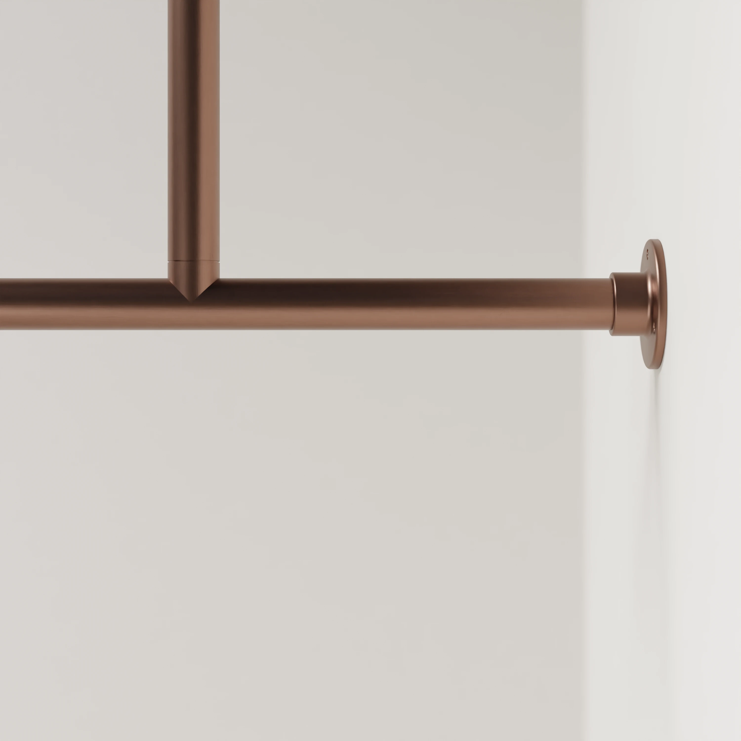 Detailansicht der Garderobenstange A an der Wand montiert, bronze, rund Ø34mm, ohne Haken, mit Mittelstütze.