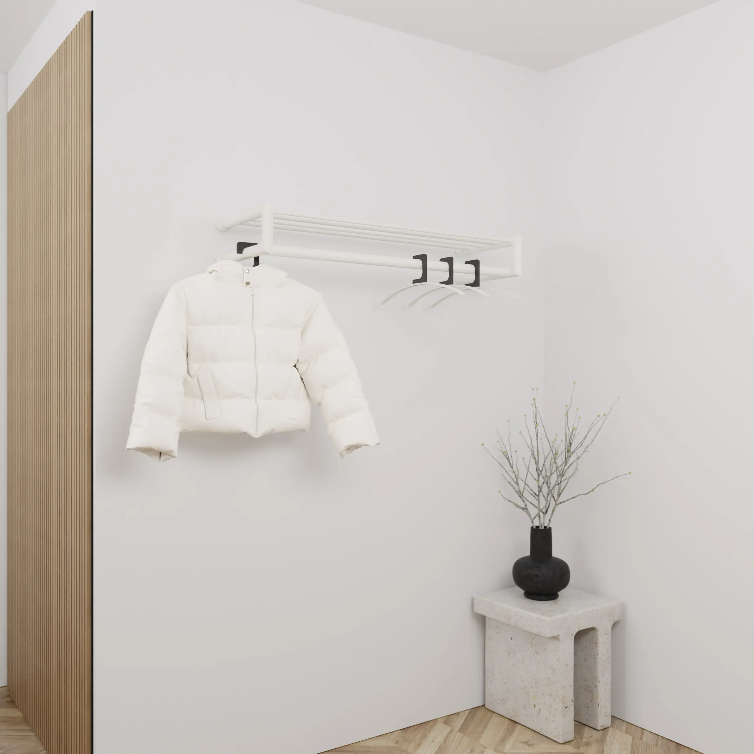 Coat rack Uven round white mounted on the wall in an interior with clothing.