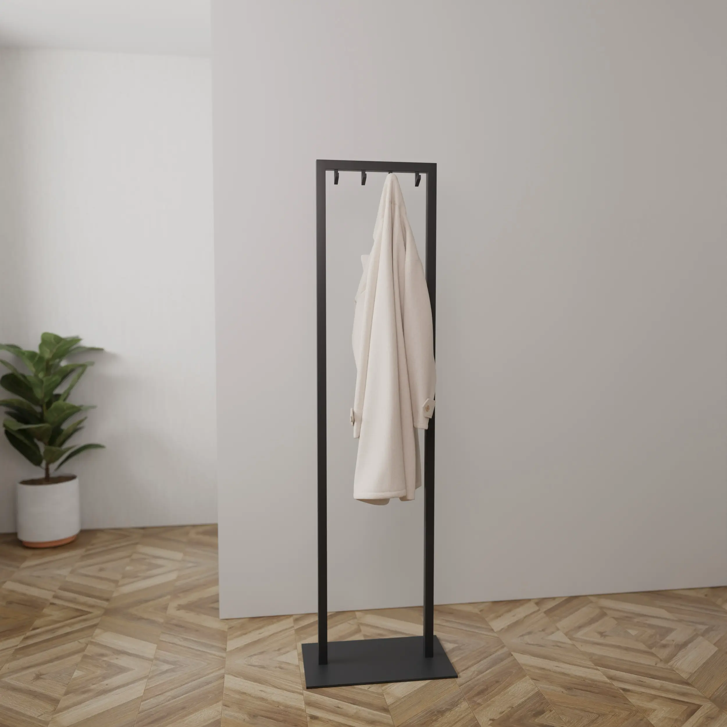 Coat rack Taren anthracite mounted on the wall in an interior with clothing.