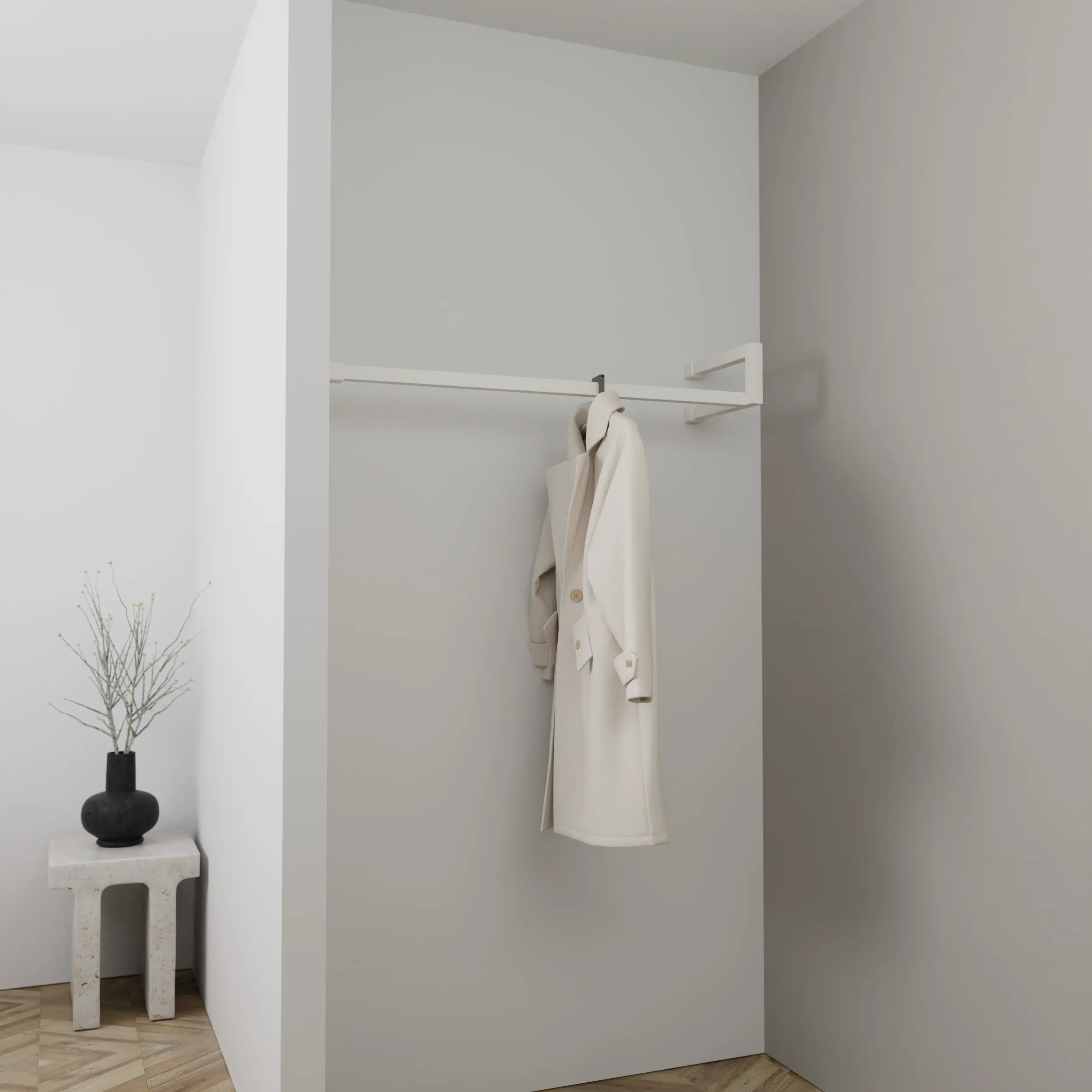 Garderobe Lorien quadratisch weiß in einem Interieur mit Kleidung an der Wand montiert.