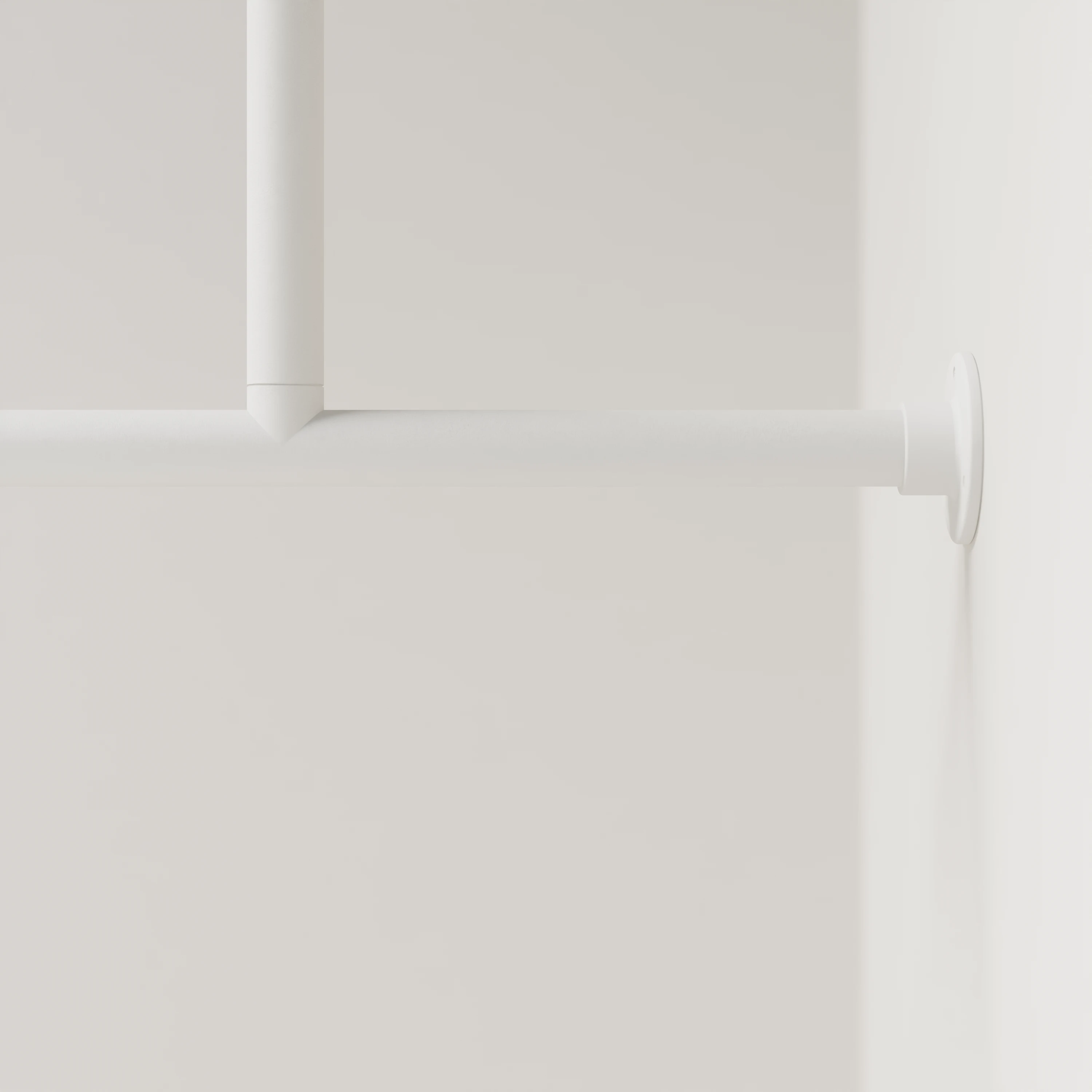 Detail view of clothes rail A mounted on the wall, white, round Ø34mm, without hooks, with centre support.
