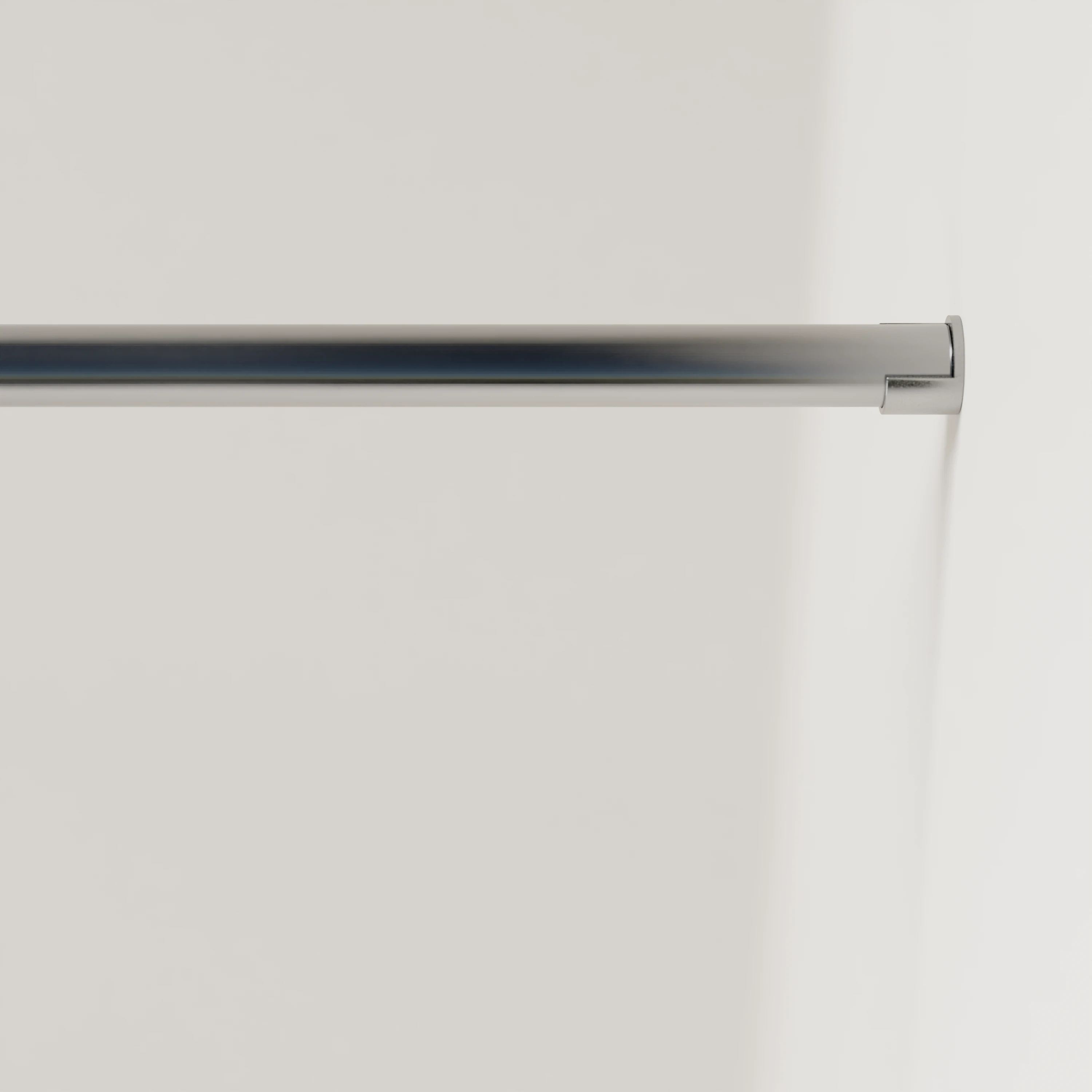 Garderobestang U RVS rond wandmodel gemonteerd aan de wand met detail van de eindhouder.