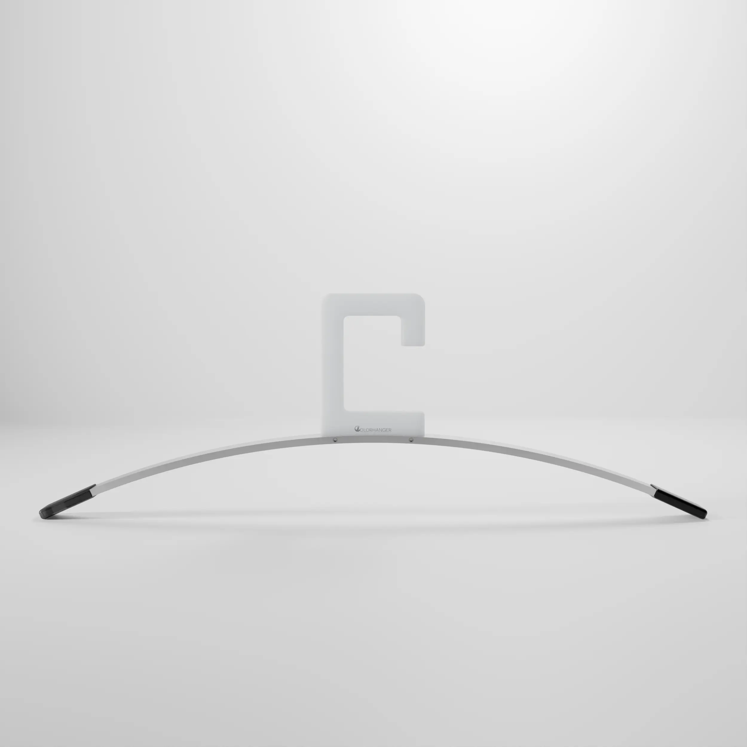 Freestanding product view of the Moov clothes hanger in stainless steel with transparent plastic hook, suitable for square 30x30mm rails.