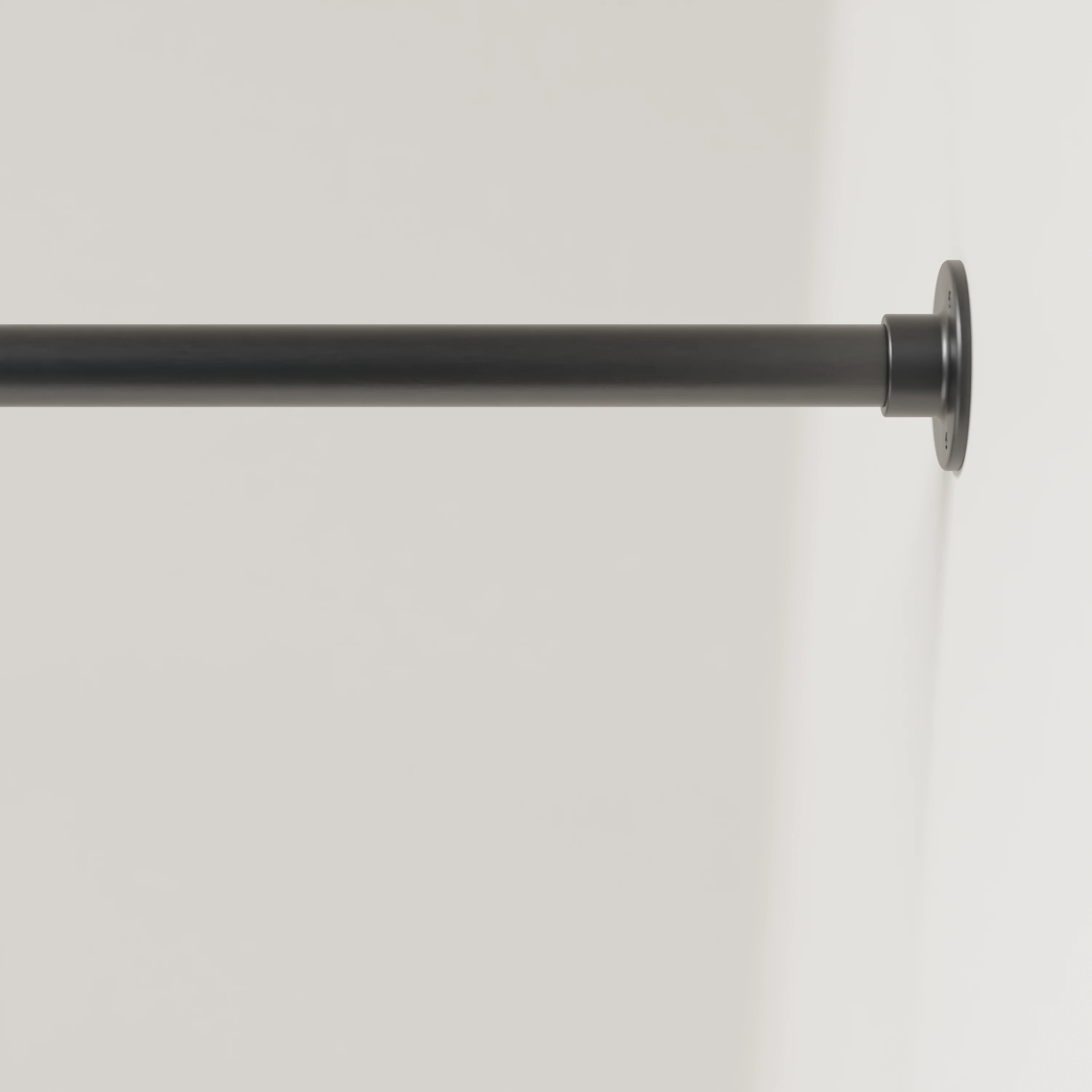 Detailansicht der Garderobenstange A an der Wand montiert, schwarz, rund Ø25mm, ohne Haken.