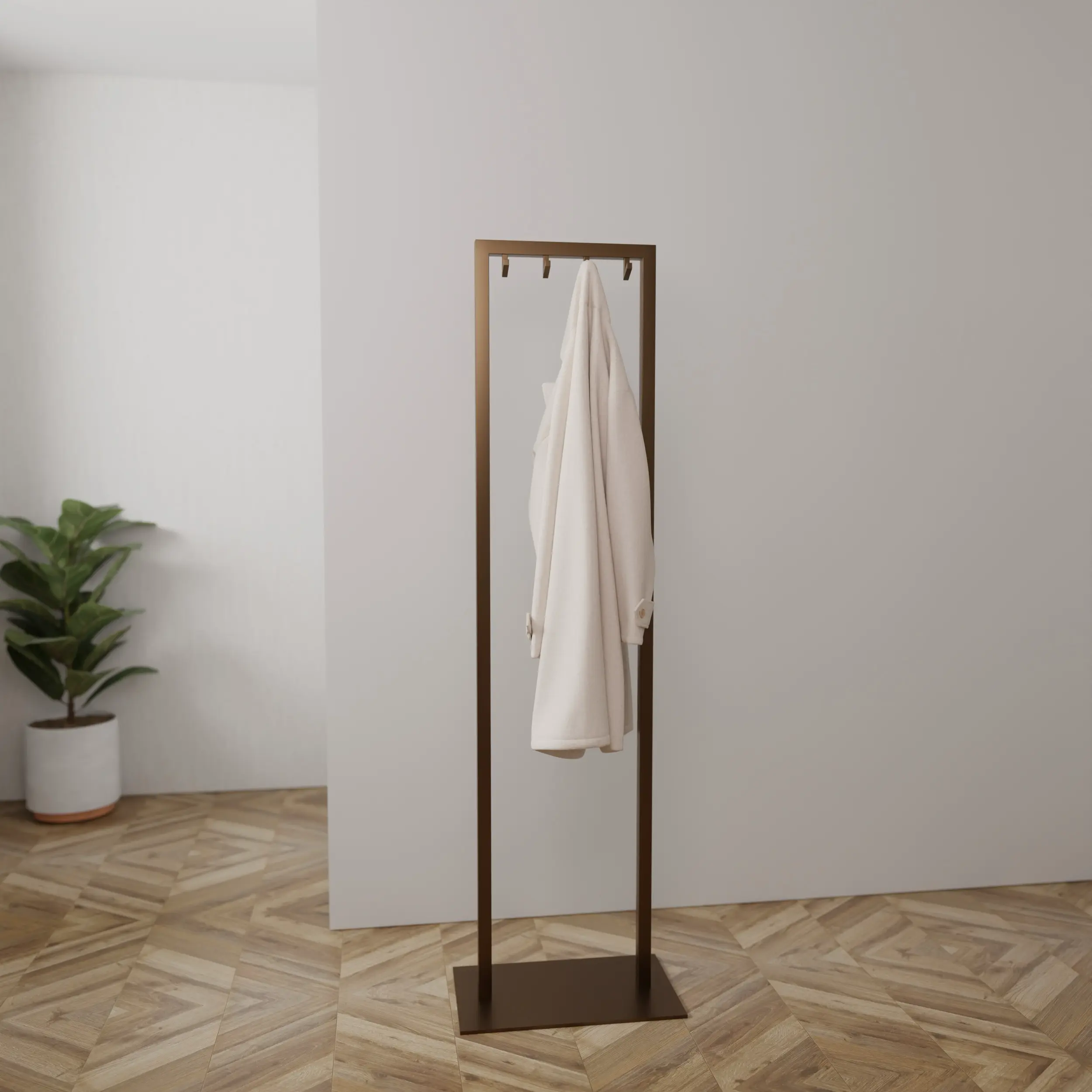 Coat rack Taren bronze mounted on the wall in an interior with clothing.