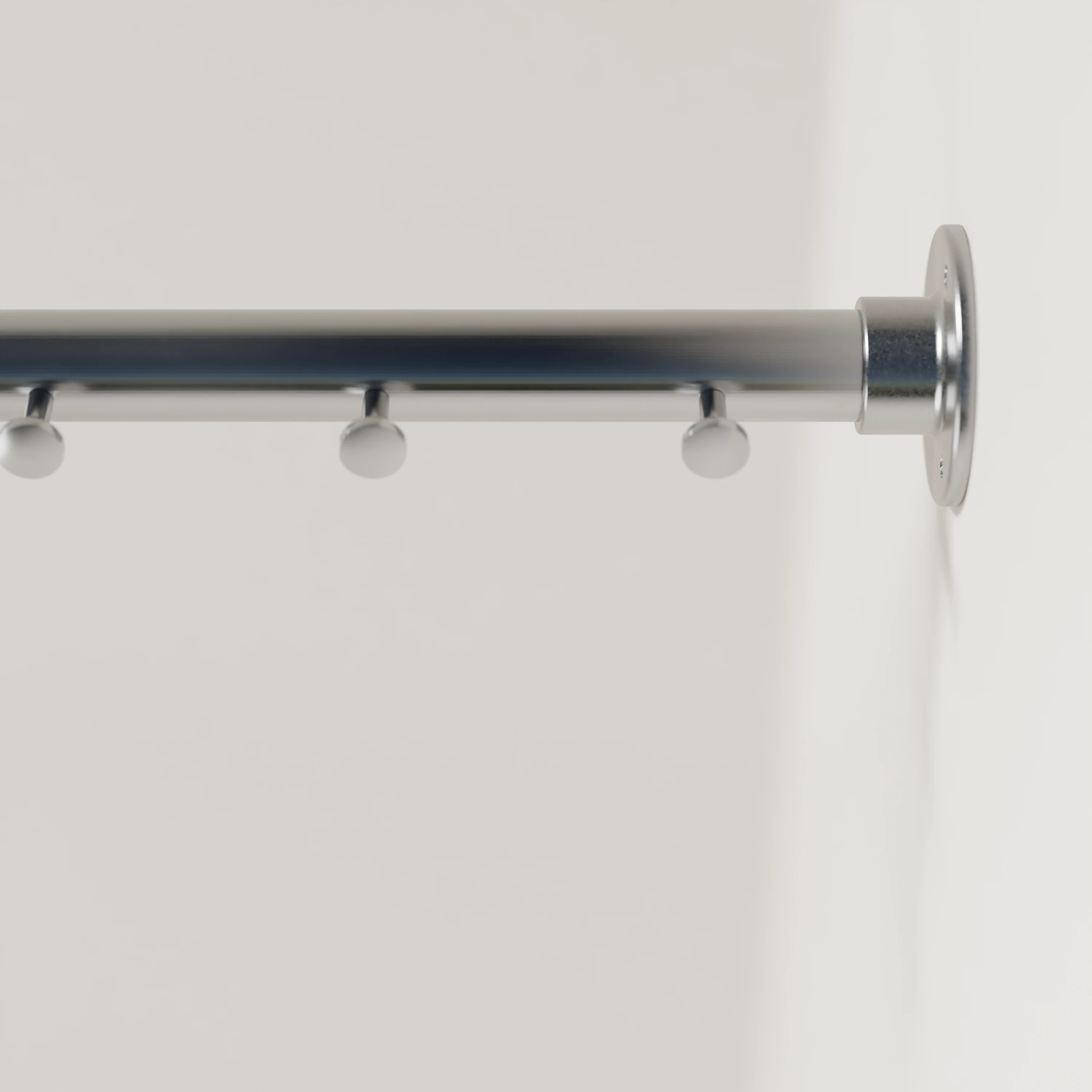 Detail view of clothes rail A mounted on the wall, stainless steel, round Ø34mm, with hooks.