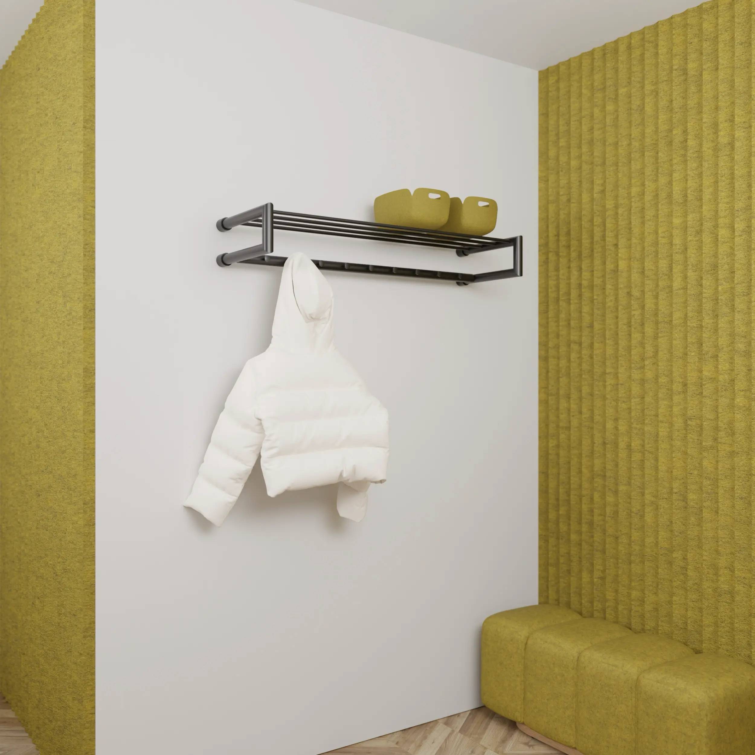 Garderobe Uven rund schwarz in einem Interieur mit Kleidung an der Wand montiert.