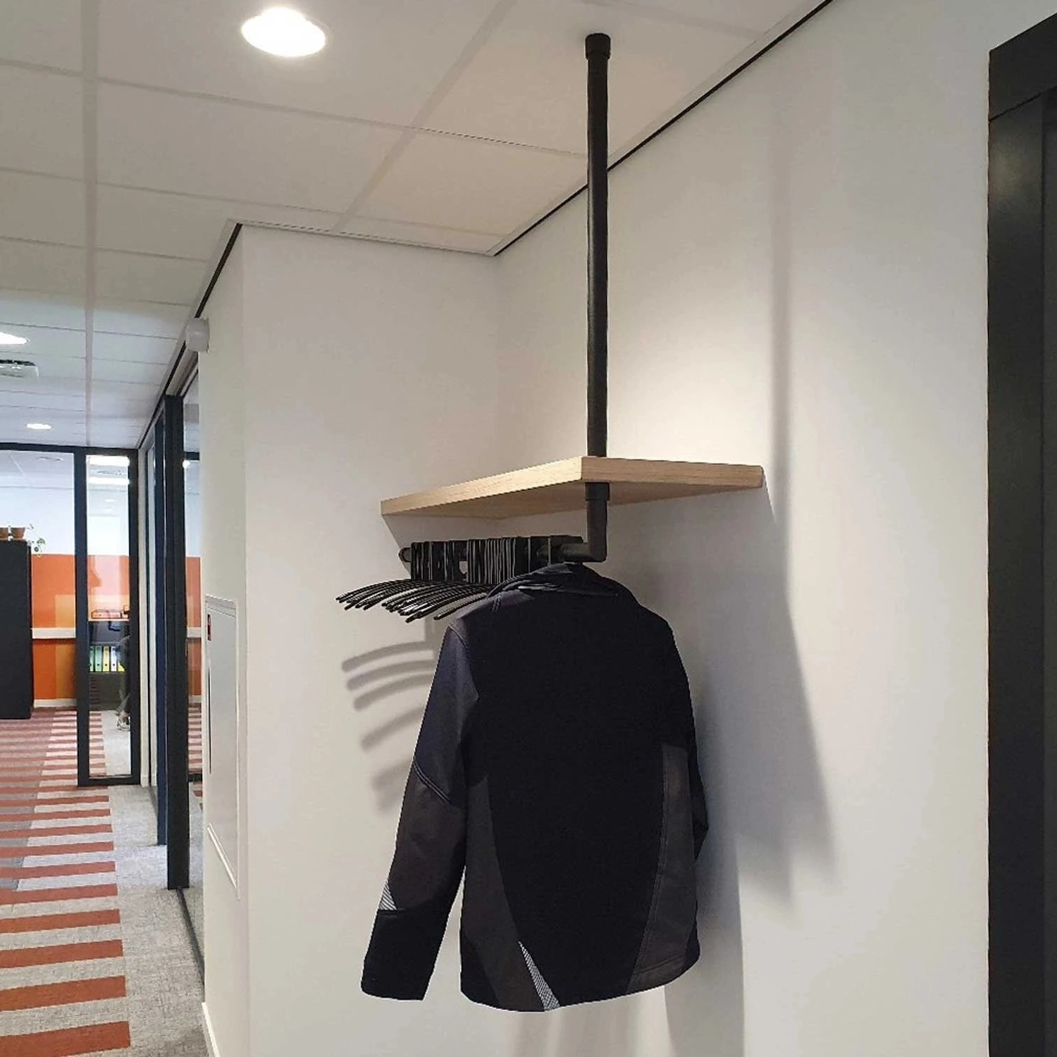 Coat rack Lovan round black shown as a cut-out product view.